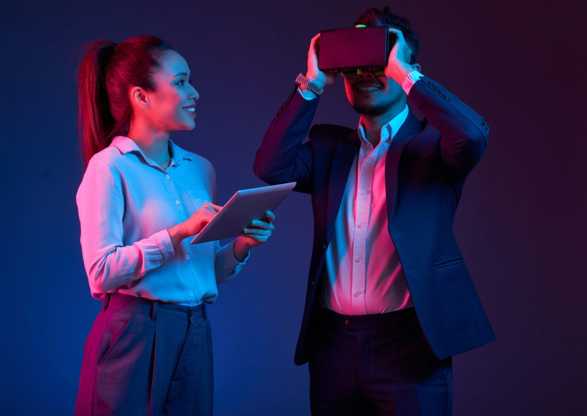 Team of Vietnamese developers testing virtual reality application they created